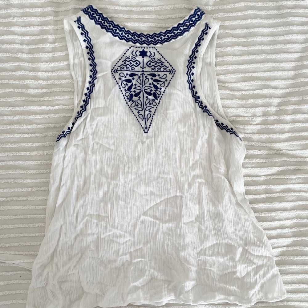 Cute tank with blue detail.